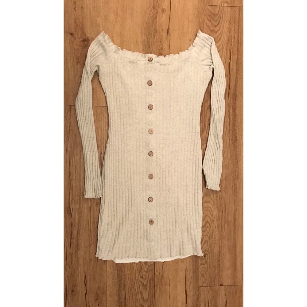 Sweater over the shoulder dress